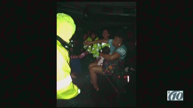 Police rescue family stuck in ditch amid Hurricane Irma